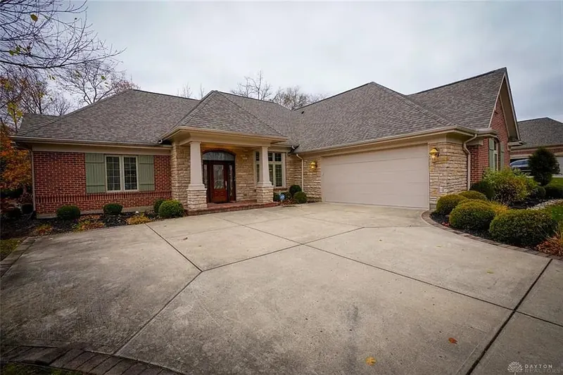 Photo of a brick and stone ranch home